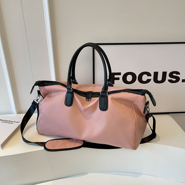 Elegantly Designed Travel Bag with Multifunctional Interior Compartments Bowlift