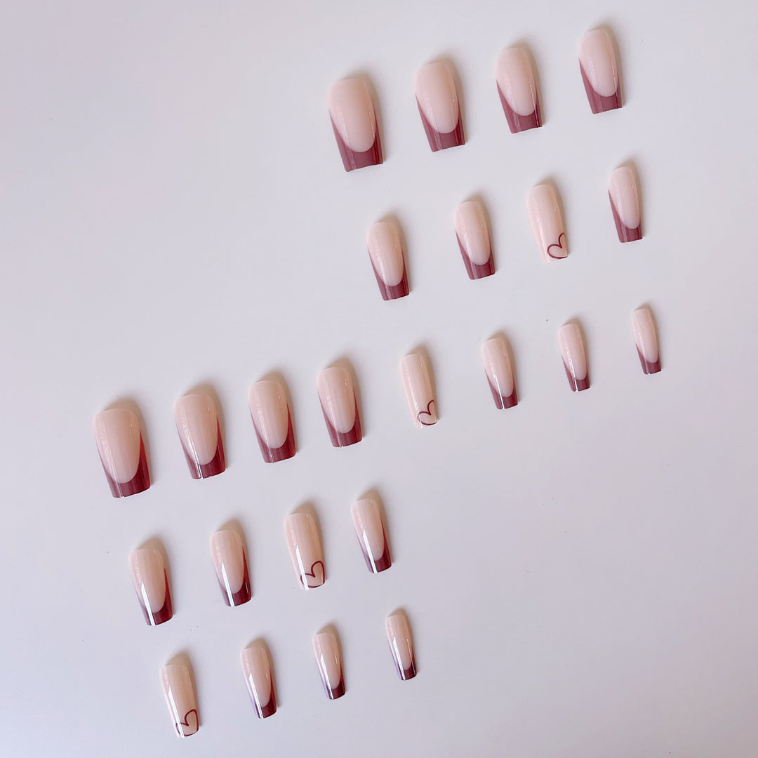 Glamorous artificial nails with elegant tips and heart design Bowlift
