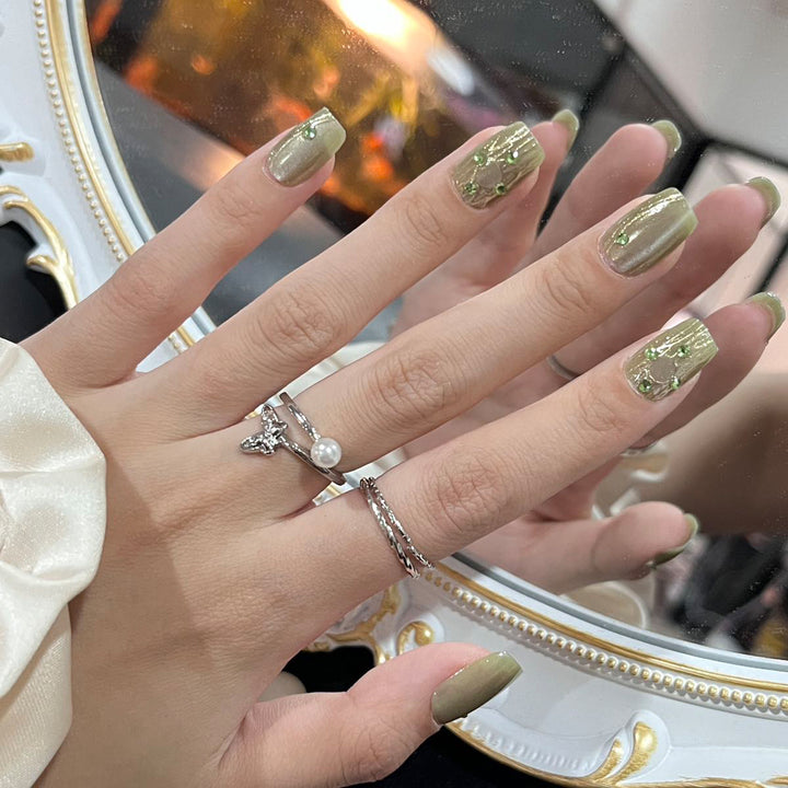 Elegant Long Press-On Nails Set with Artistic Tips Bowlift