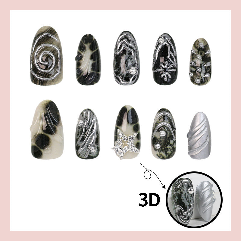 Art nail set with artistic patterns and glitter accents Bowlift