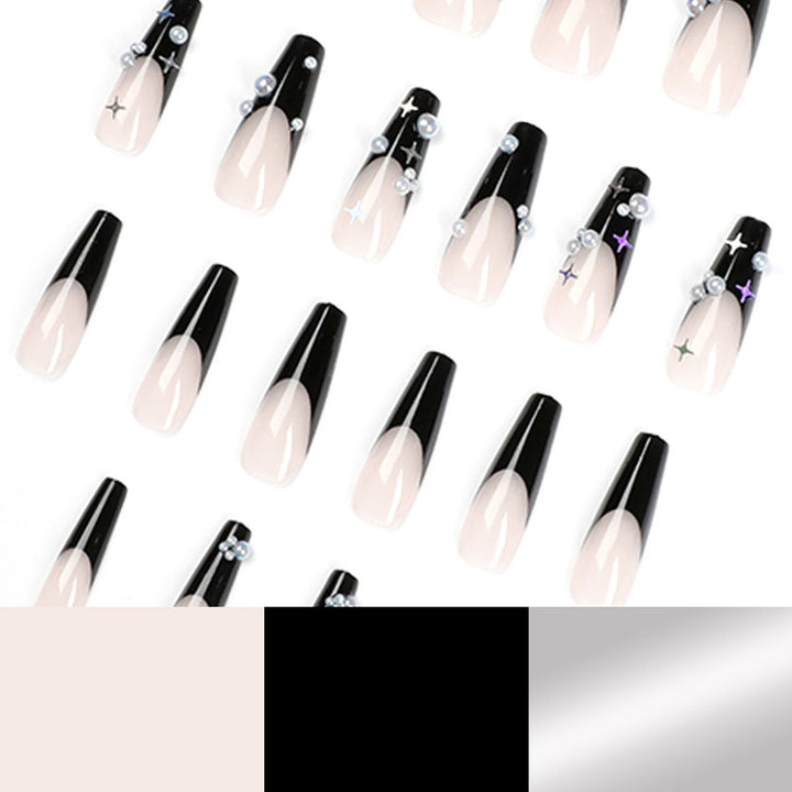 Artificial nail art with pearl and shine elements Bowlift