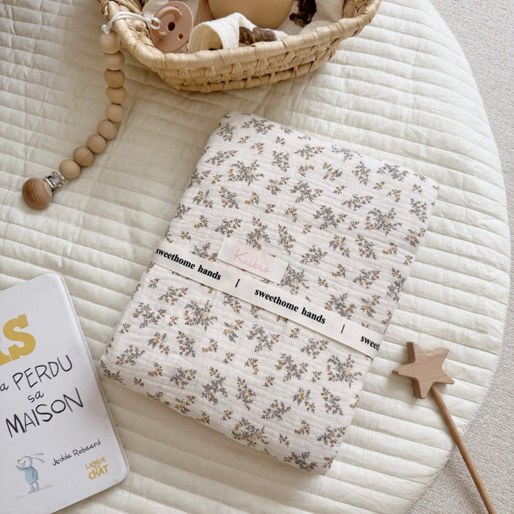 Unisex Muslin Blanket with delicate floral design and elegant ruffles Bowlift