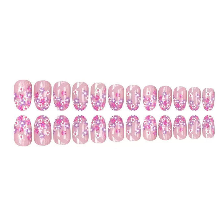 Nail set with floral design and sparkling accents Bowlift