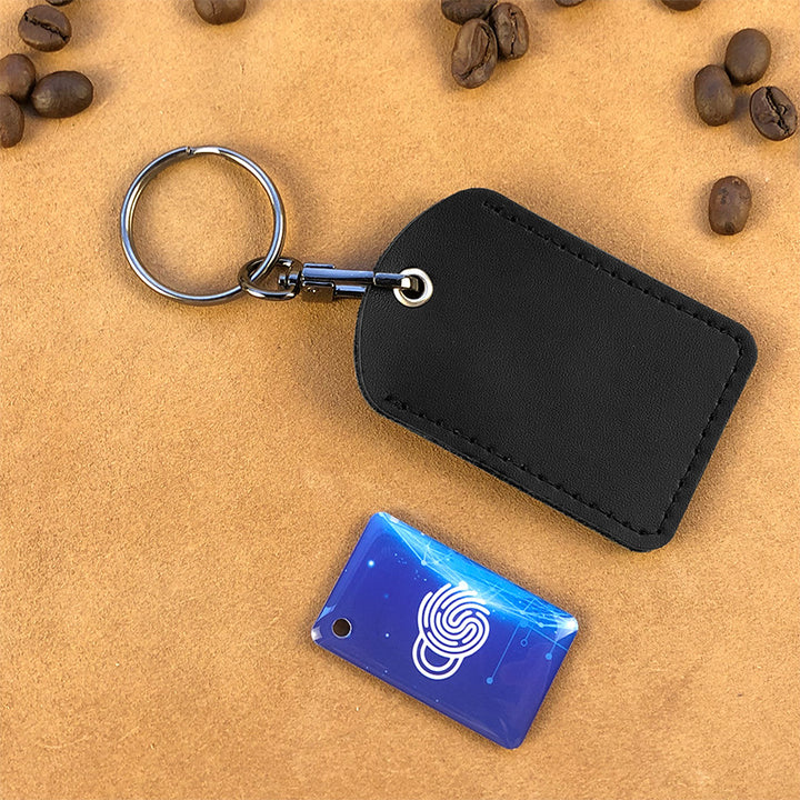 Unisex keychain with integrated Tracker Bowlift