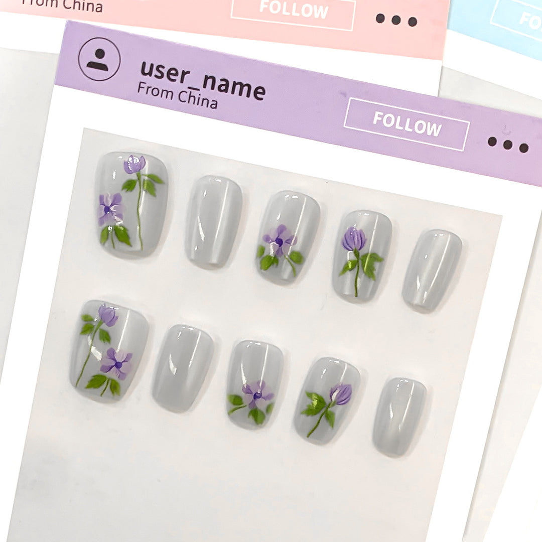 Artistic fingernails with floral accents Bowlift