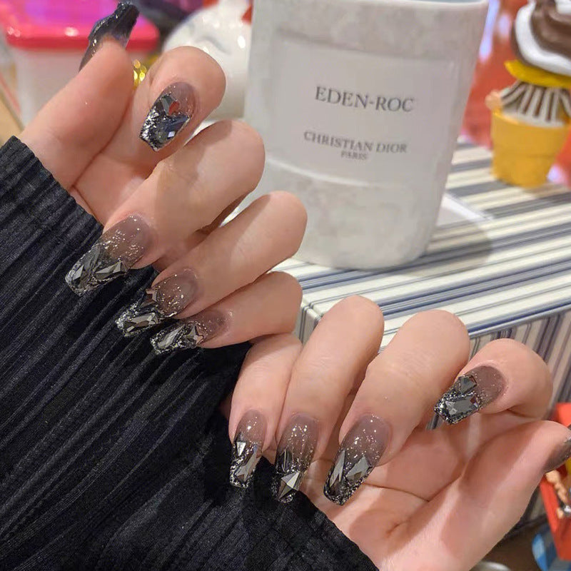 Glamorous artificial nails with moon and star motifs Bowlift
