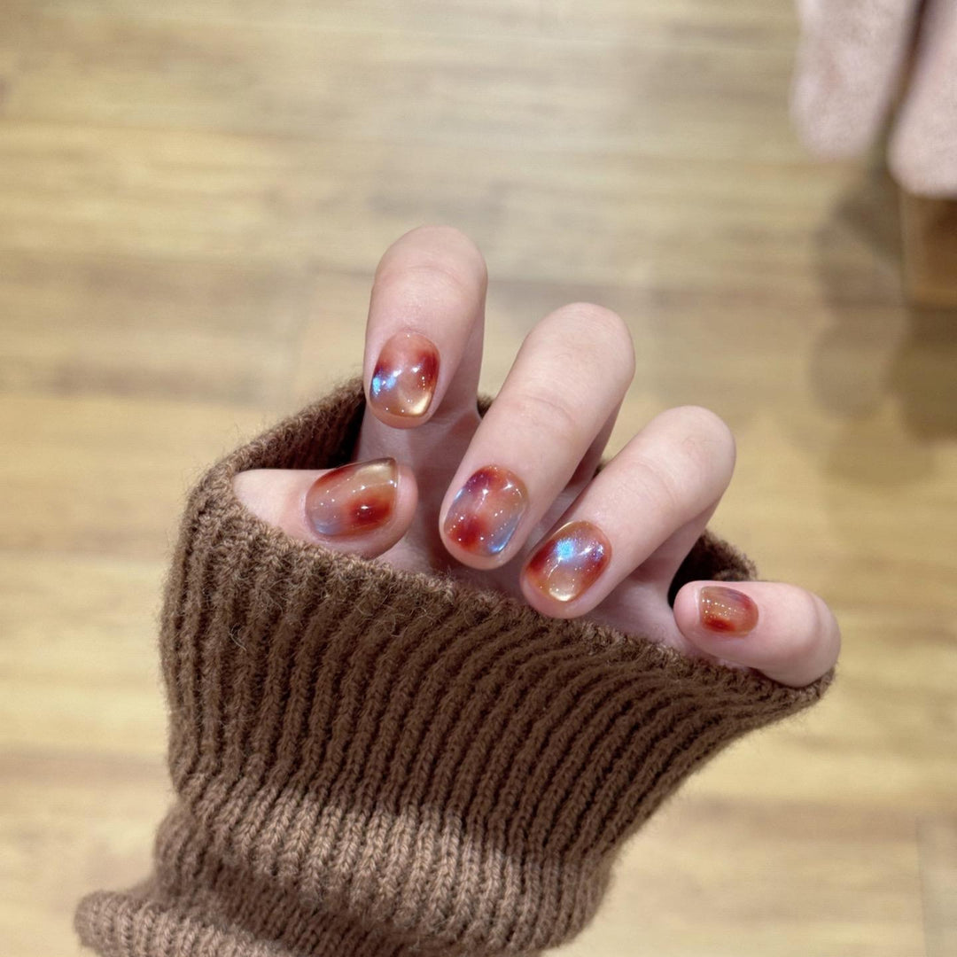 Artificial nails with shimmering galaxy patterns Bowlift