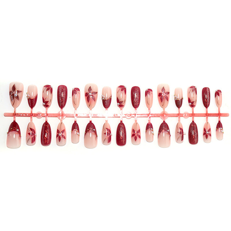 Elegant Press-On Nail Set with Floral and Gem Accents Bowlift