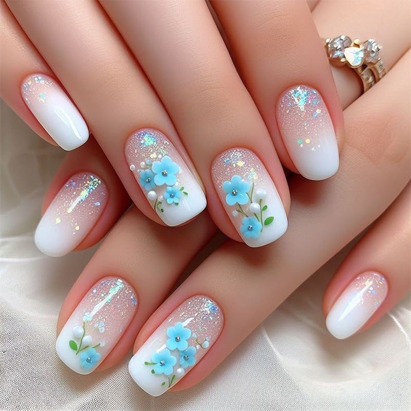 Artful nail extensions with floral design Bowlift