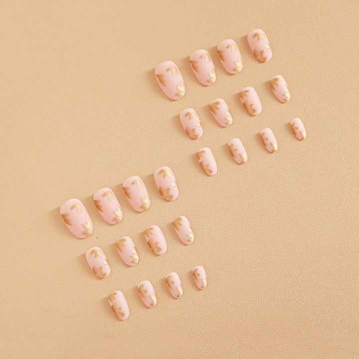 Artificial nail set with elegant gold leaf design Bowlift