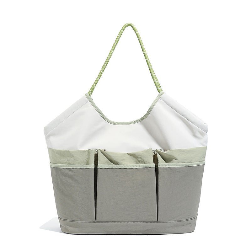Generous Tote Bag With Multiple Outside Pockets Bowlift