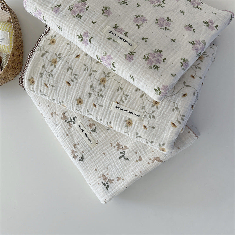 Unisex versatile muslin blanket with floral accents Bowlift