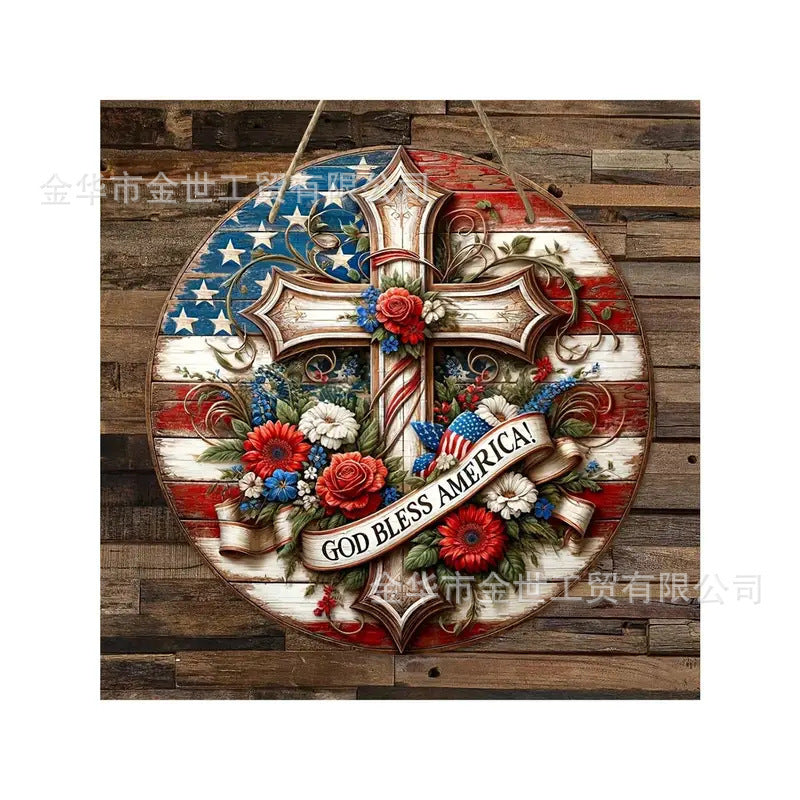 Independence Day rustic round wooden patriotic cross wall plaque with floral accents and God Bless America banner Bowlift