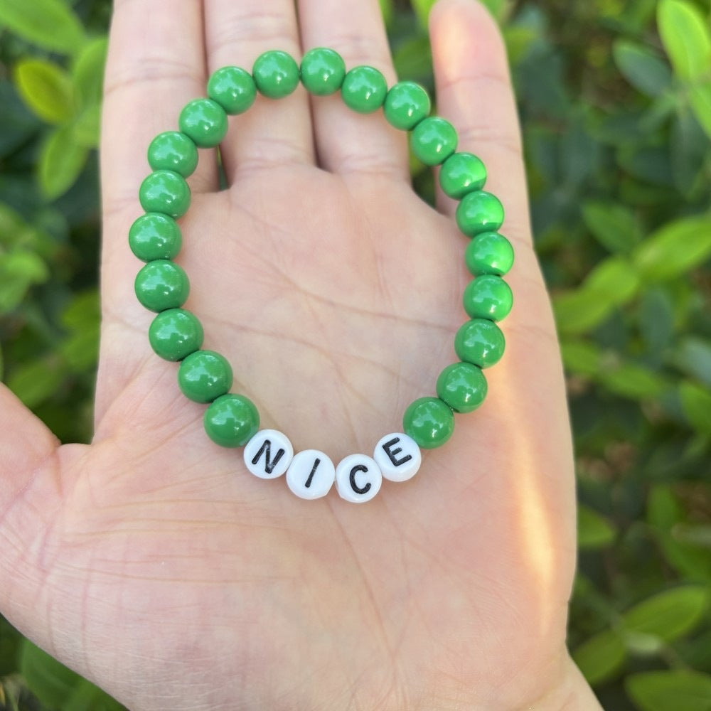 Friendship bracelet made of pastel beads Bowlift