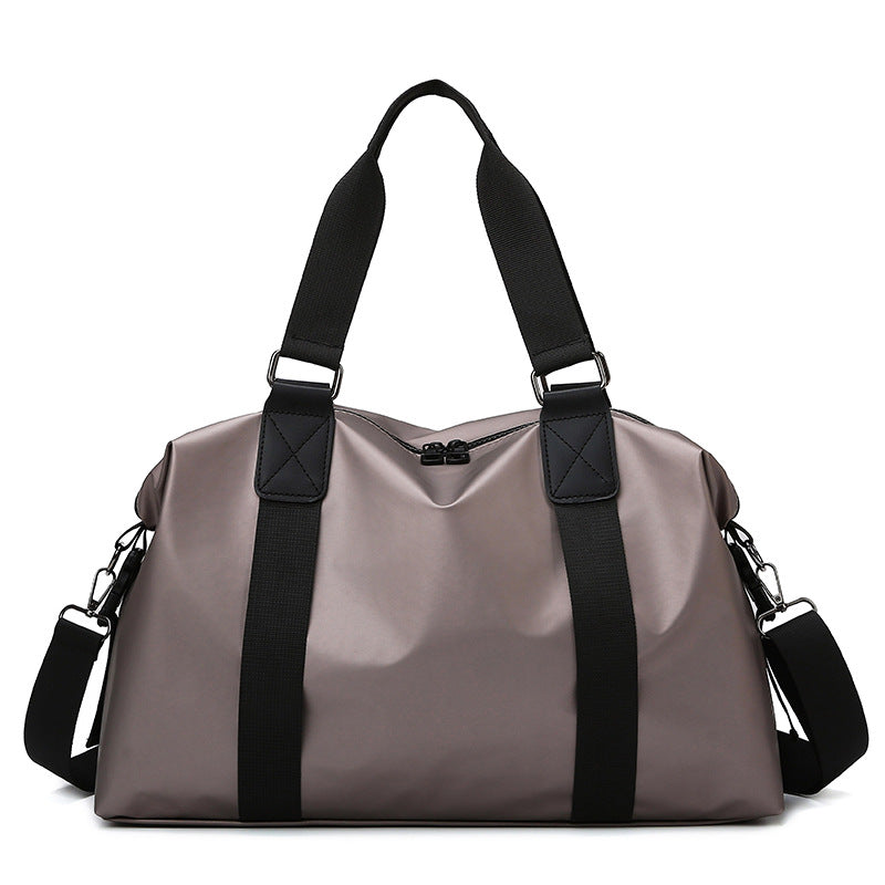 Athletic travel bag made of weather-resistant material with adjustable carrying handles Bowlift