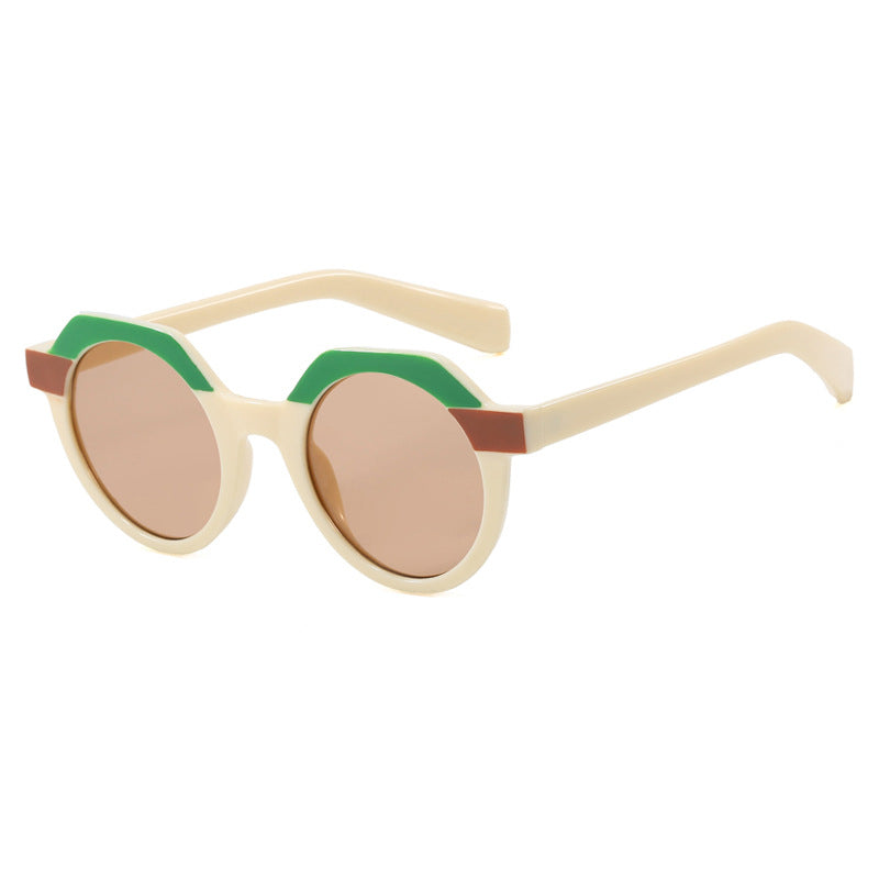 Ladies extravagant round sunglasses with colored accented frame Bowlift