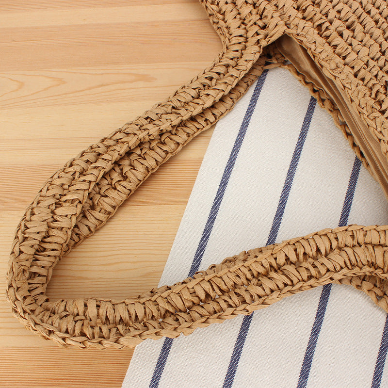 Handcrafted raffia shoulder bag with floral details Bowlift