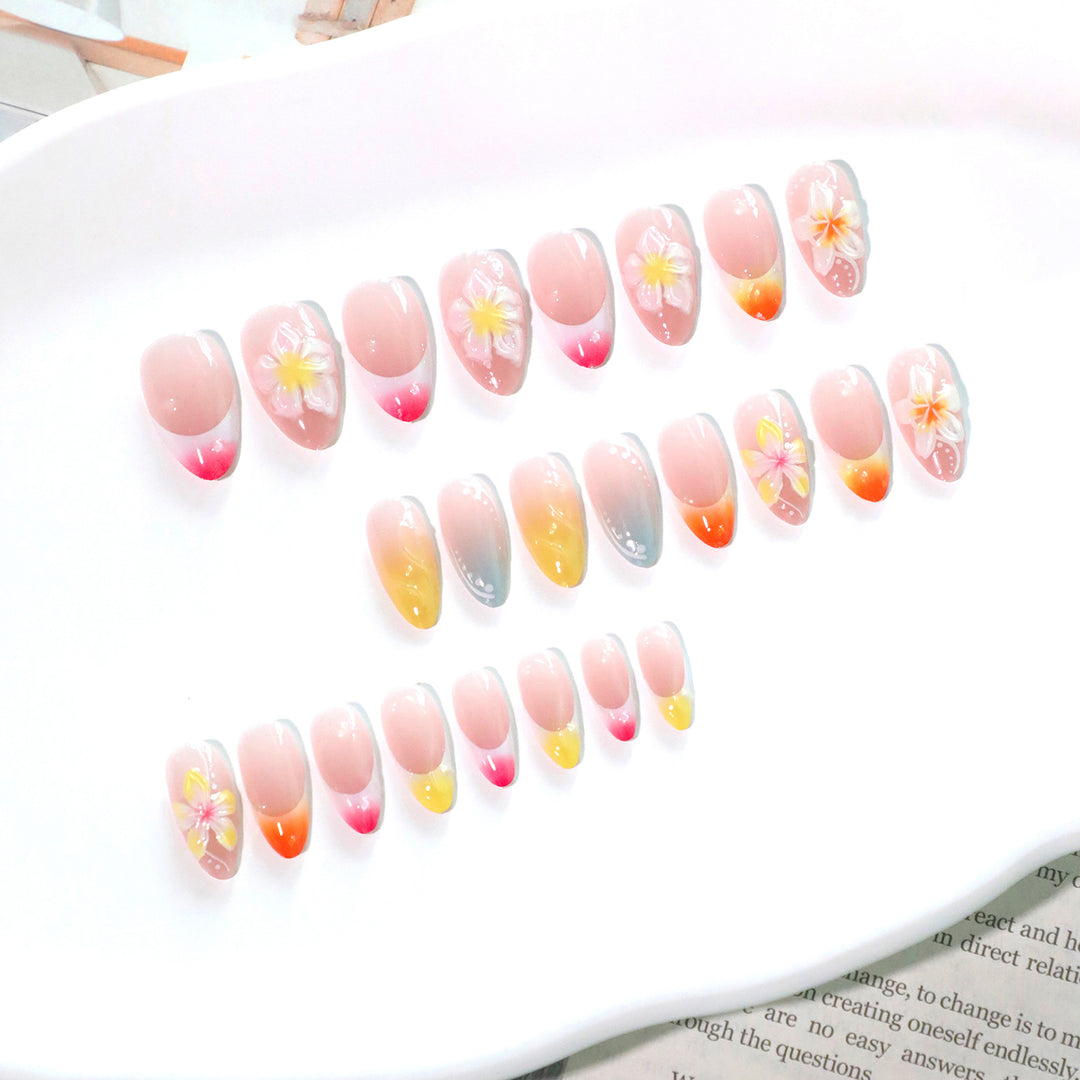 Artistic nail designs with floral accents and soft color gradients Bowlift