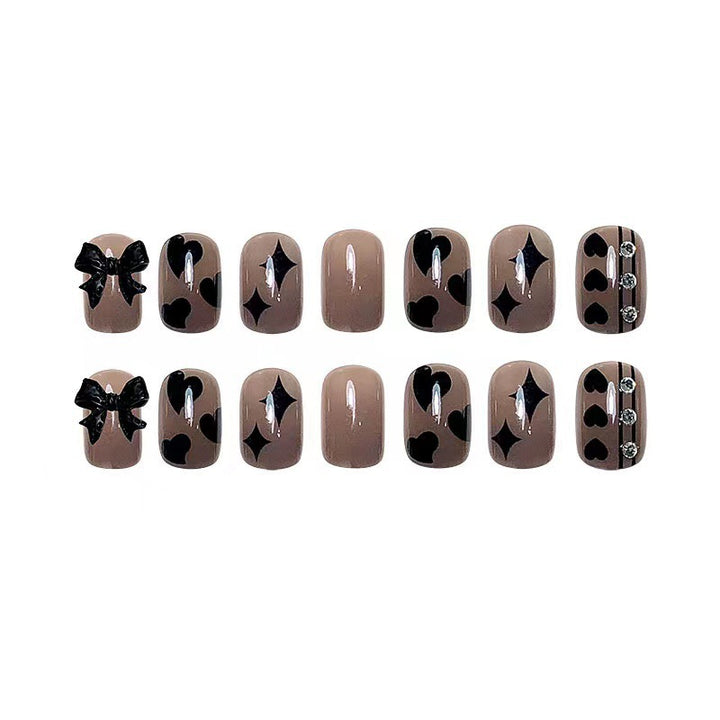 Artificial nails with elegant ribbon and heart designs Bowlift