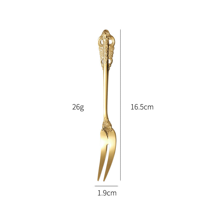 Elegant fish fork with artistic handle design Bowlift