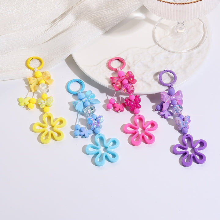 Playful keychain with flower and butterfly details Bowlift