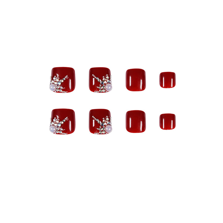 Artful toenail design with elegant rhinestone design Bowlift