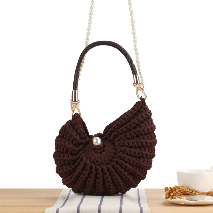 Evening bag with pearl decorated handle Bowlift