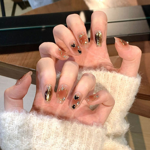 Artistic Press-On Nail Set with Heart and Glitter Accents Bowlift