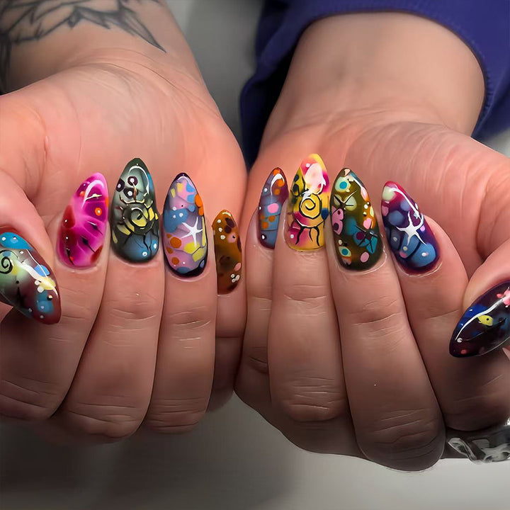 Artificial nails with handcrafted designs Bowlift