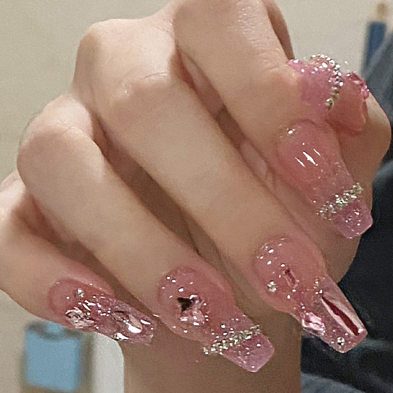 Glamorous artificial nails with delicate flower and glitter effects Bowlift