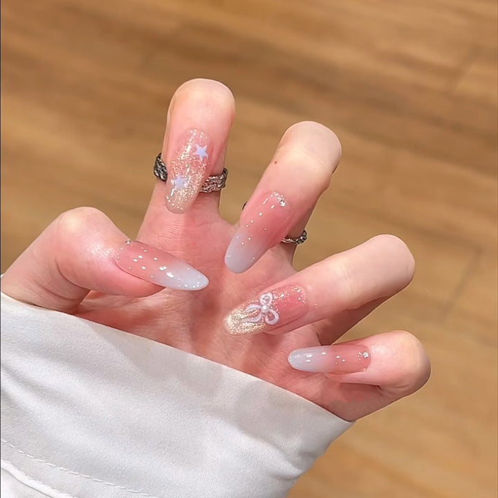 Artistic Press-On Nail Set with Glitter and Floral Accents Bowlift