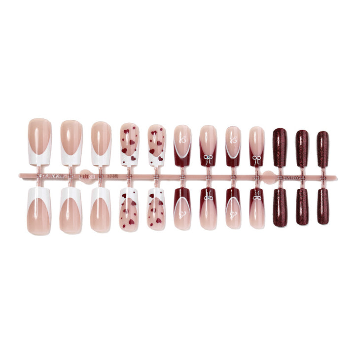 Elegant Press-On Nail Set with Artistic Heart and Glossy Finish Bowlift