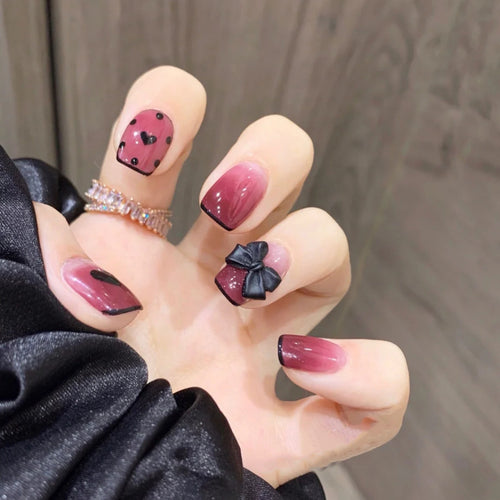 Artificial nail tips with bow design Bowlift