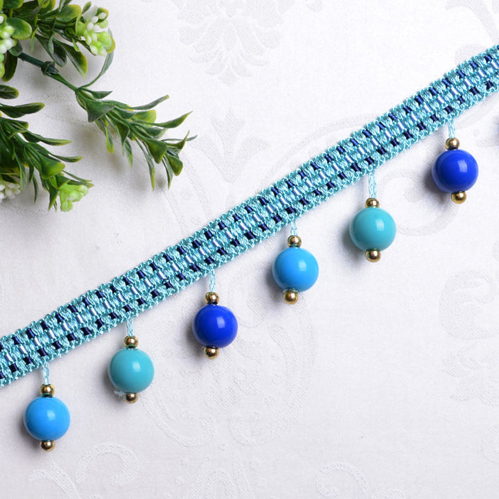 Decorative lace trim with colorful pendants Bowlift