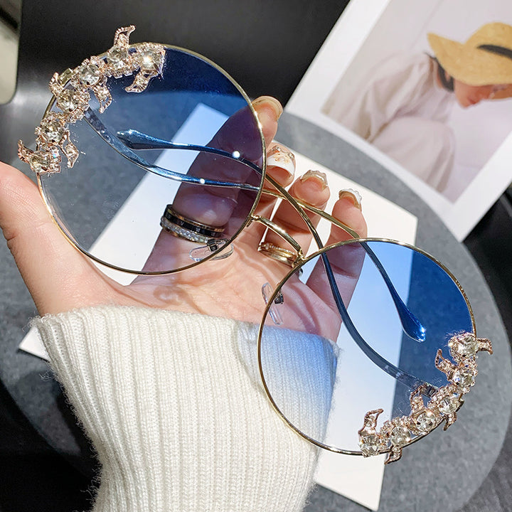 Women's fashion sunglasses with extravagant design and sparkling accents Bowlift