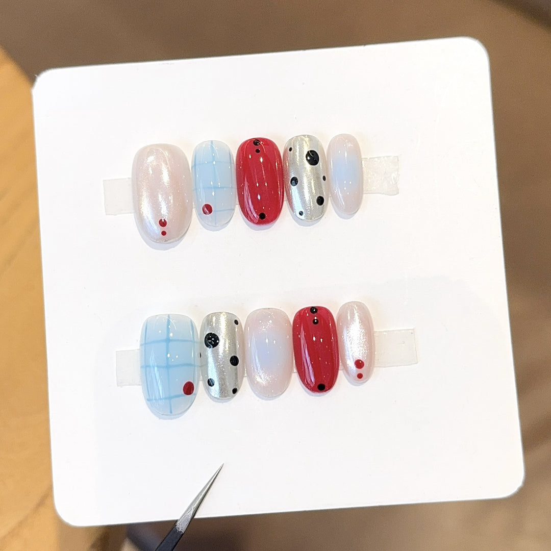 Artificials nails with creative geometric design and modern accents Bowlift