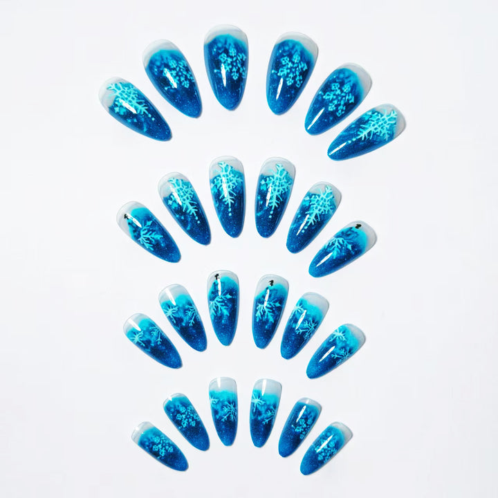 Clear nail design with glitter and snowflake motif Bowlift