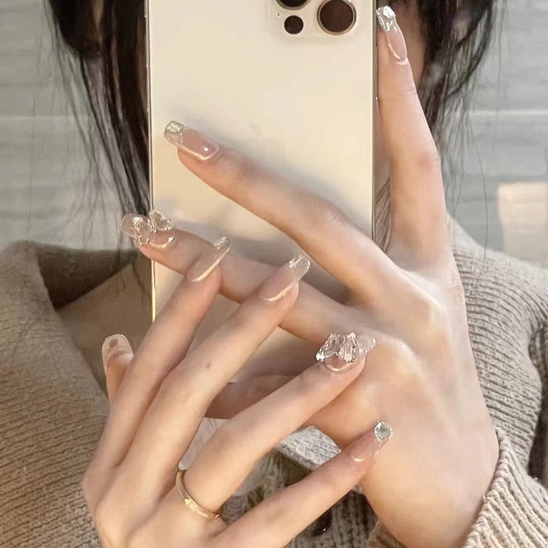 Glamorous artificial nails with delicate rhinestone decorations Bowlift