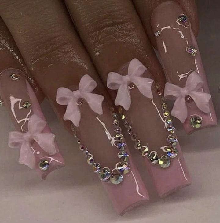 Nail art set with delicate arch decorations and rhinestone details Bowlift