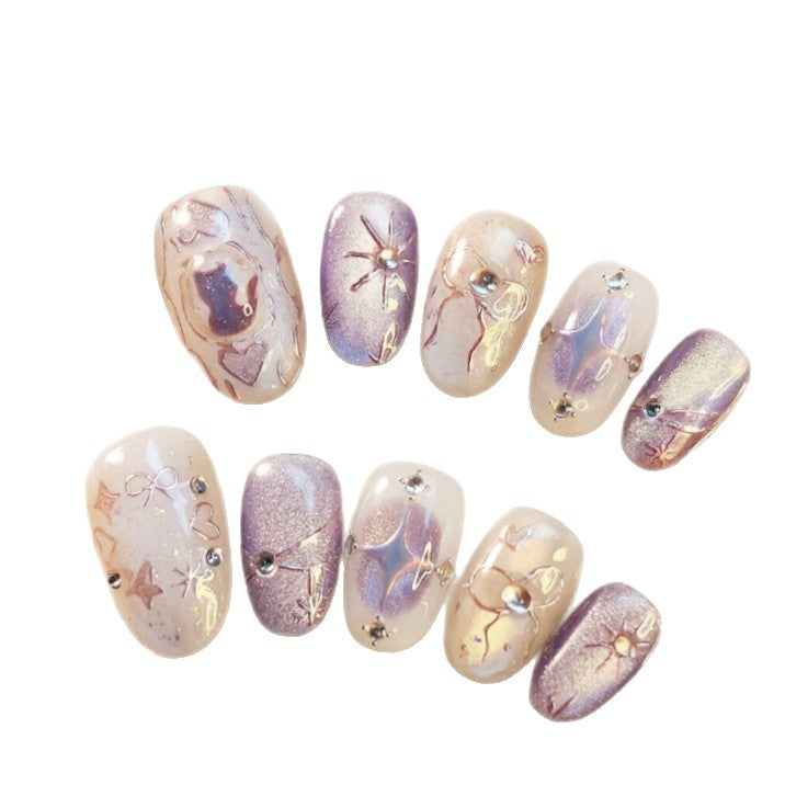 Artificial nails with playful bow and star design Bowlift
