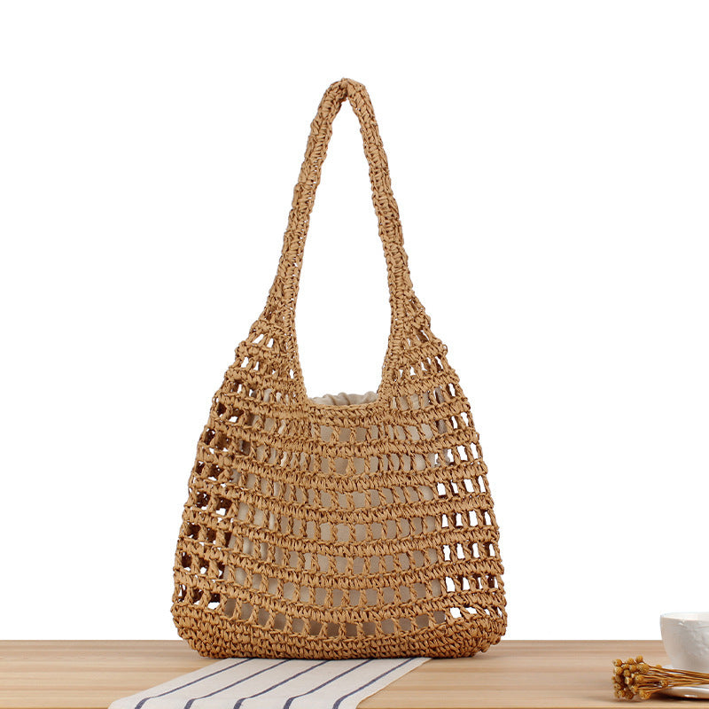 Handcrafted net shoulder bag with sturdy carrying handle Bowlift
