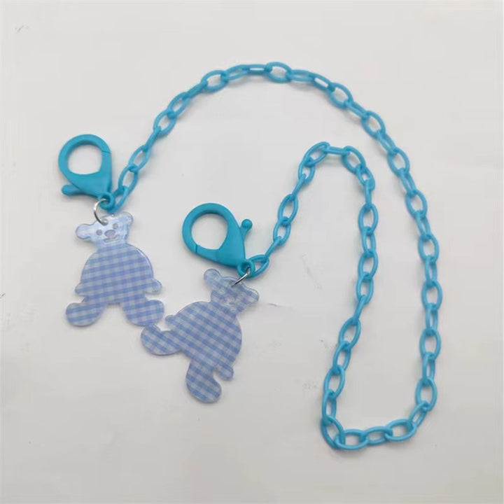 Glasses strap made of transparent resin with rainbow pendant Bowlift
