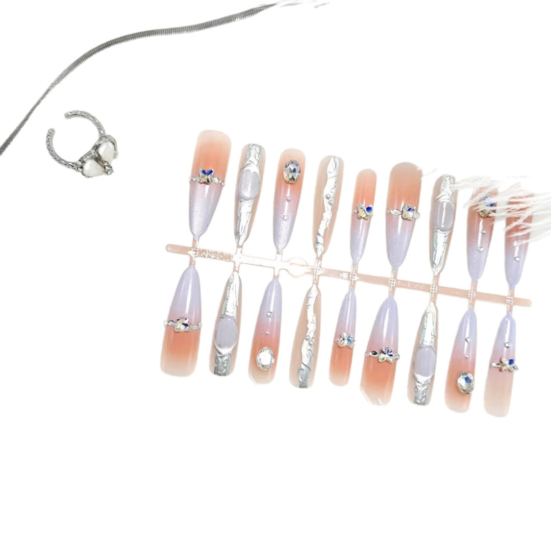Artificial nails with elegant glitter design and fine 3D decorations Bowlift