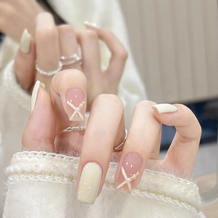 Acrylic nail set with elegant and playful design Bowlift