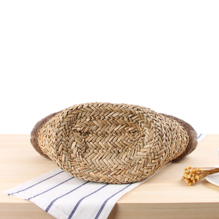 Basket bag with fluffy upper edge and decorative bow detail Bowlift