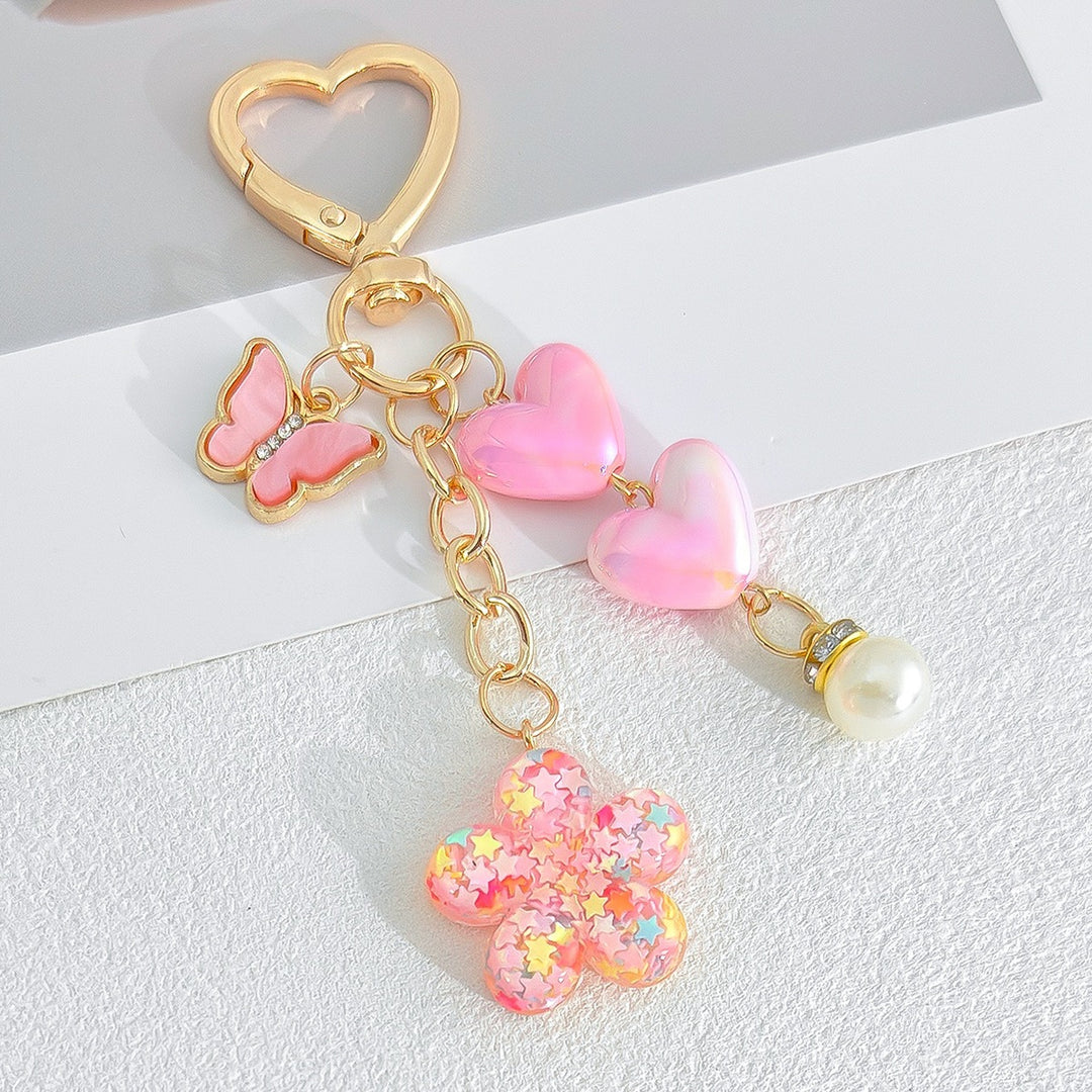 Playful keychain with hearts and flower motif Bowlift