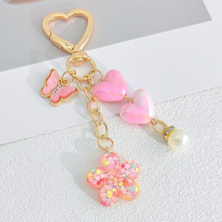 Playful keychain with hearts and flower motif Bowlift