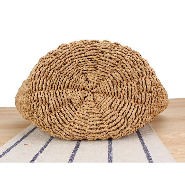 Basket bag made of woven natural material with leather handles Bowlift