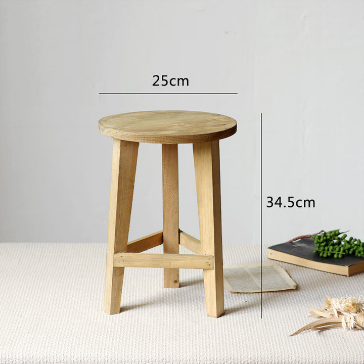 Rustic stool made of solid wood Bowlift