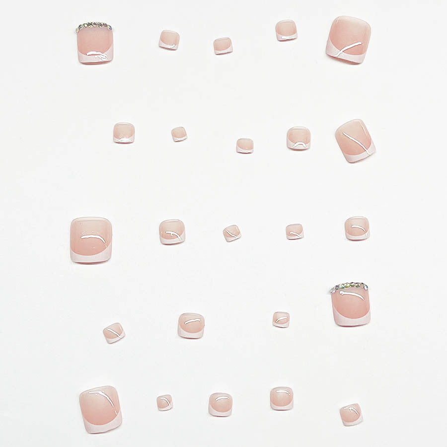 Nail art set with elegant French design and sparkling accents Bowlift
